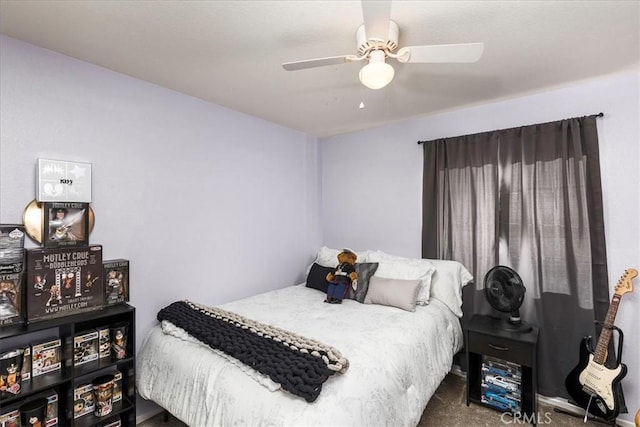 bedroom featuring a ceiling fan and carpet