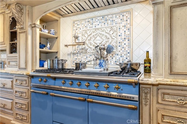 1015 Wild Oats Way, Templeton, CA 93465 - interior space featuring light stone countertops, arched walkways, backsplash, and double oven range