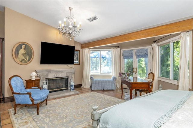 1015 Wild Oats Way, Templeton, CA 93465 - bedroom with an inviting chandelier, visible vents, a premium fireplace, and baseboards