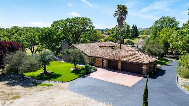 1015 Wild Oats Way, Templeton, CA 93465 - view of front of property featuring driveway, a chimney, a tiled roof, a front yard, and a garage