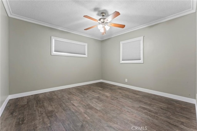 empty room with ceiling fan, dark wood-style flooring, and crown molding