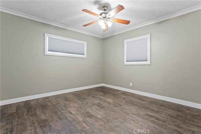 unfurnished room with crown molding, ceiling fan, wood finished floors, and baseboards