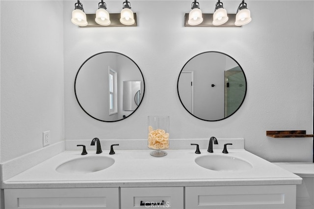 full bath featuring double vanity and a sink