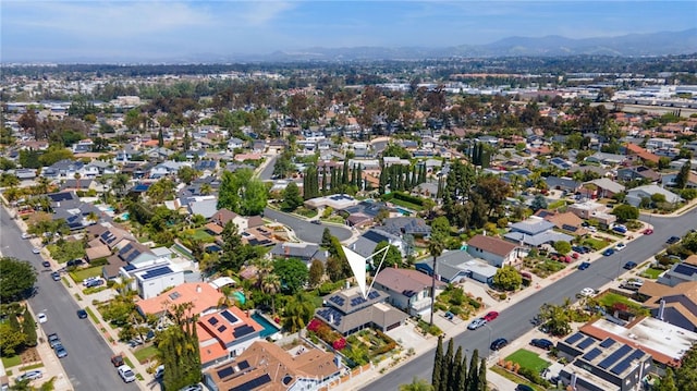 bird's eye view featuring a residential view and a mountain view
