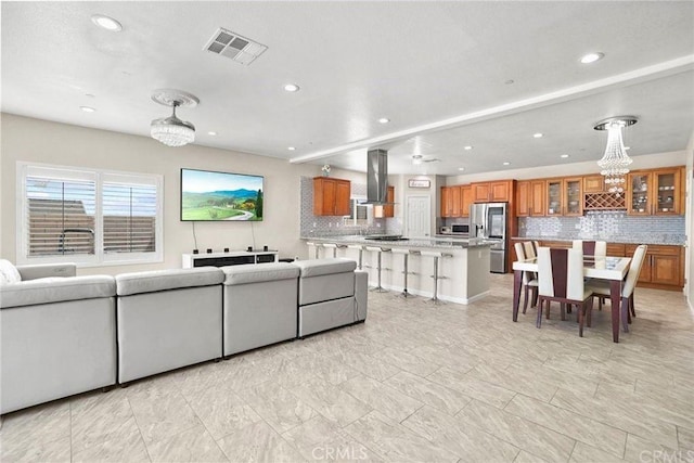 5491 N Pinnacle Ln, San Bernardino, CA 92407 - living area featuring recessed lighting and a chandelier