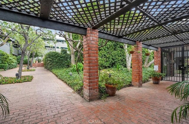 11767 W Sunset Blvd Unit 206, Los Angeles, CA 90049 - view of patio / terrace featuring a pergola