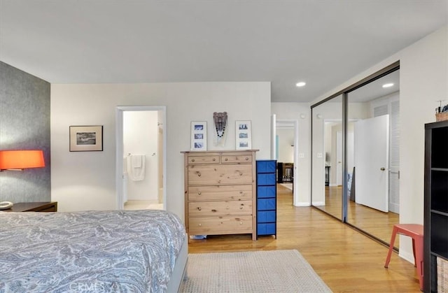 11767 W Sunset Blvd Unit 206, Los Angeles, CA 90049 - bedroom with wood finished floors, a closet, recessed lighting, and ensuite bath