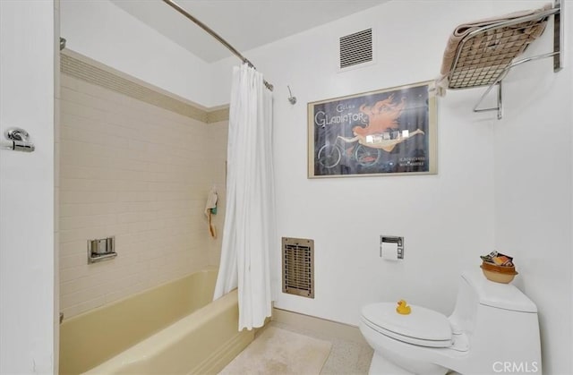 11767 W Sunset Blvd Unit 206, Los Angeles, CA 90049 - bathroom featuring toilet, shower / bath combination with curtain, and baseboards