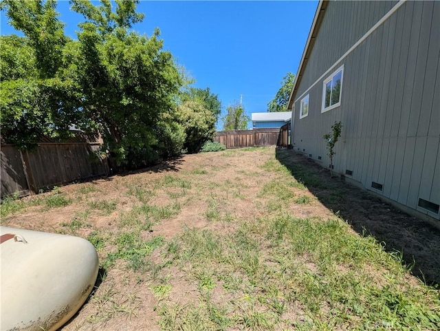 view of yard featuring a fenced backyard