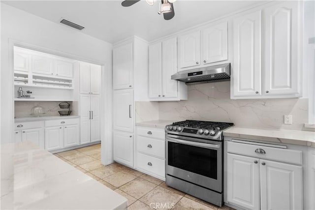 kitchen with visible vents, white cabinetry, under cabinet range hood, and stainless steel range with gas cooktop