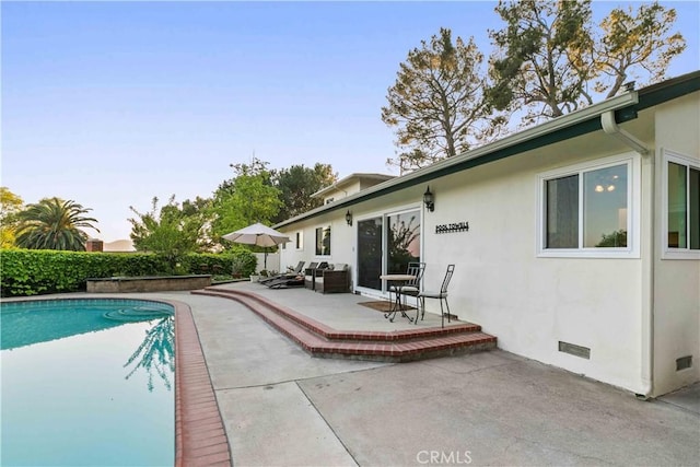 view of pool with a patio and a fenced in pool