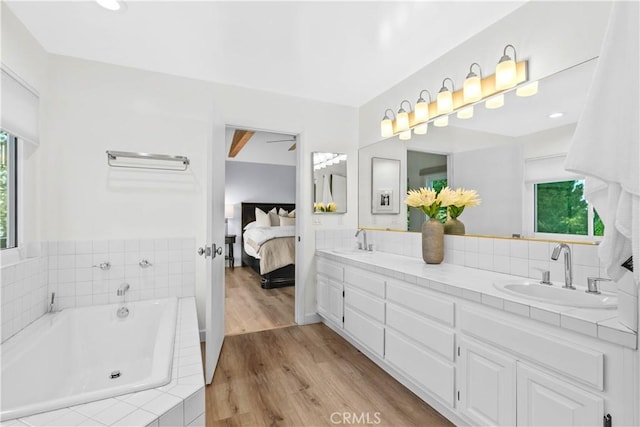 2320 Jayma Ln, La Crescenta, CA 91214 - full bath with double vanity, wood finished floors, a garden tub, and ensuite bathroom