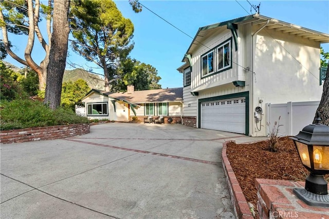2320 Jayma Ln, La Crescenta, CA 91214 - view of front of house featuring concrete driveway and a garage
