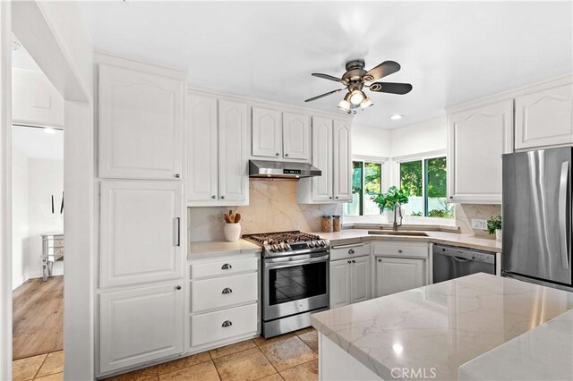 2320 Jayma Ln, La Crescenta, CA 91214 - kitchen with stainless steel appliances, under cabinet range hood, ceiling fan, white cabinets, and recessed lighting