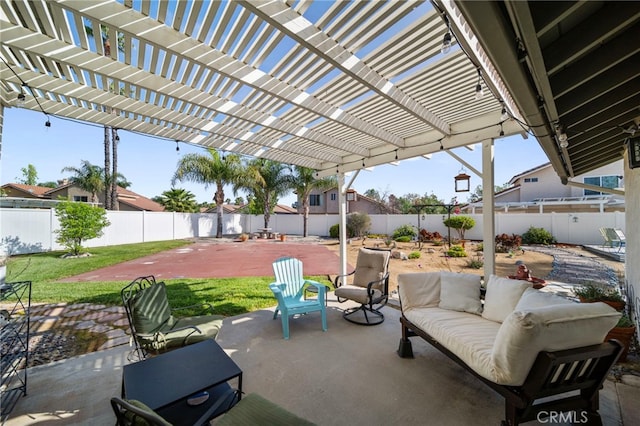 view of patio featuring a pergola, outdoor lounge area, and a fenced backyard
