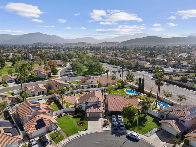 aerial view with a mountain view and a residential view