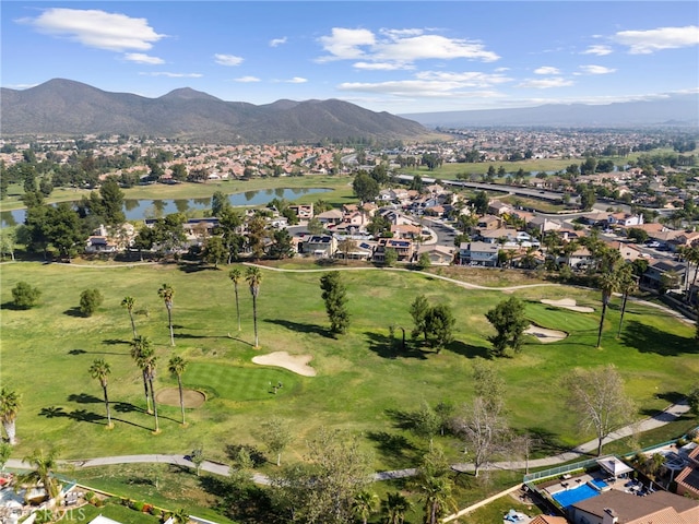 bird's eye view with a residential view, a water and mountain view, and view of golf course