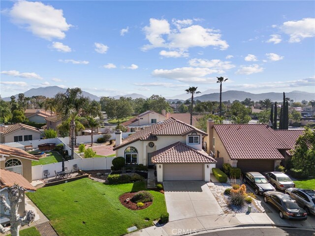 drone / aerial view with a residential view and a mountain view
