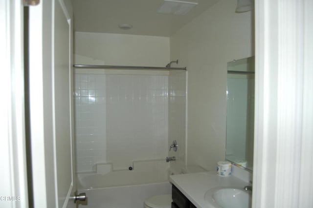 full bathroom with toilet, vanity, and shower / bathing tub combination