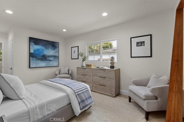 bedroom featuring recessed lighting and baseboards