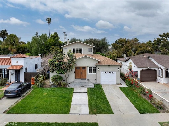 view of front of home featuring a garage, fence, a front lawn, concrete driveway, and stucco siding
