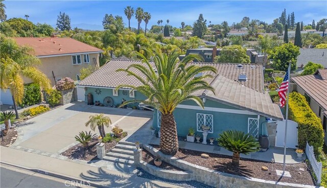 24492 Spartan St, Mission Viejo, CA 92691 - view of front of property with a gate, stucco siding, driveway, and a tile roof