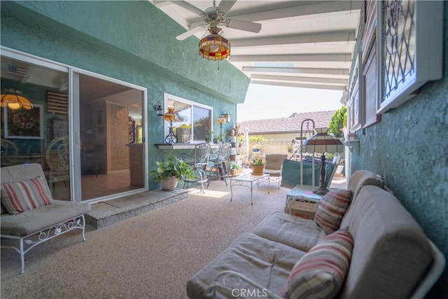 view of patio featuring a ceiling fan