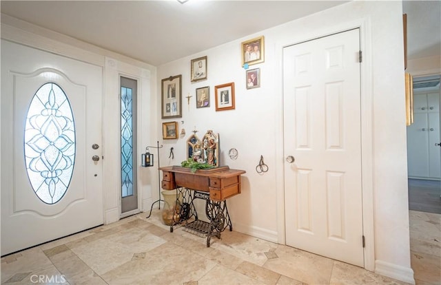 foyer with baseboards