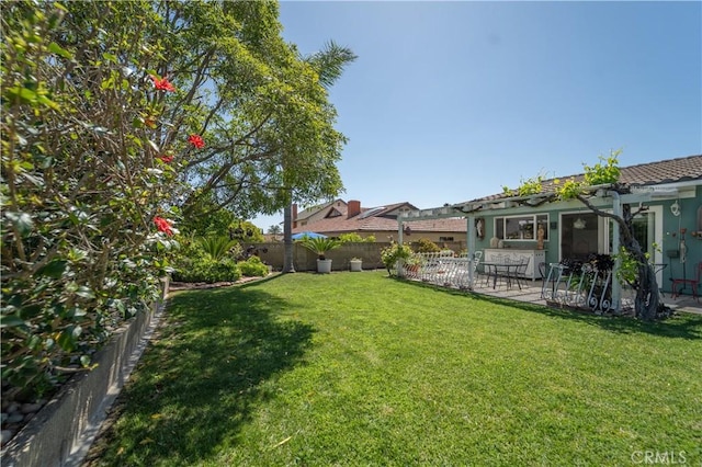 view of yard with a fenced backyard and a patio area