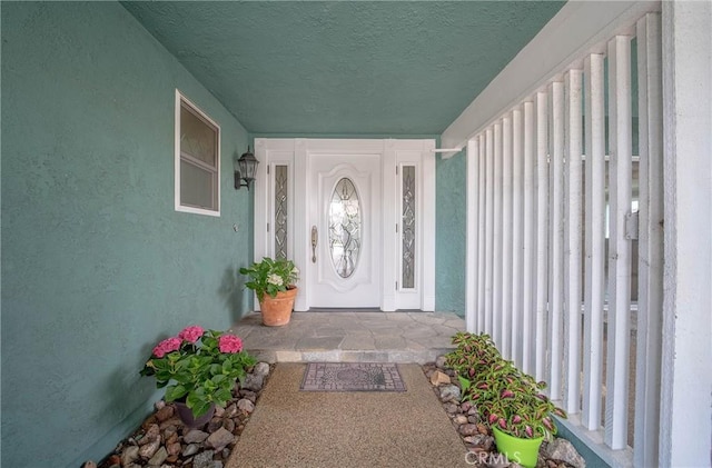 24492 Spartan St, Mission Viejo, CA 92691 - view of exterior entry featuring stucco siding