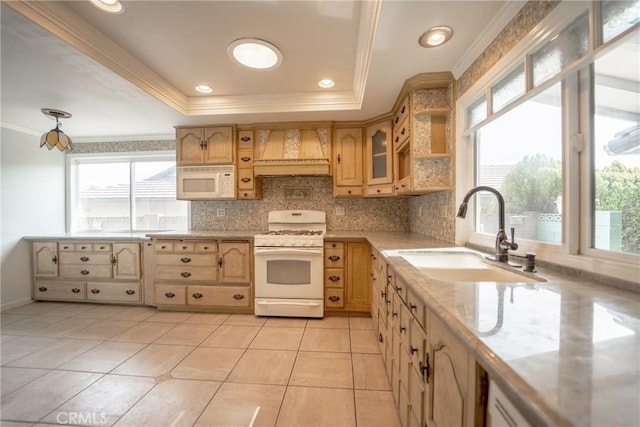 24492 Spartan St, Mission Viejo, CA 92691 - kitchen featuring white appliances, custom range hood, crown molding, decorative backsplash, and a raised ceiling