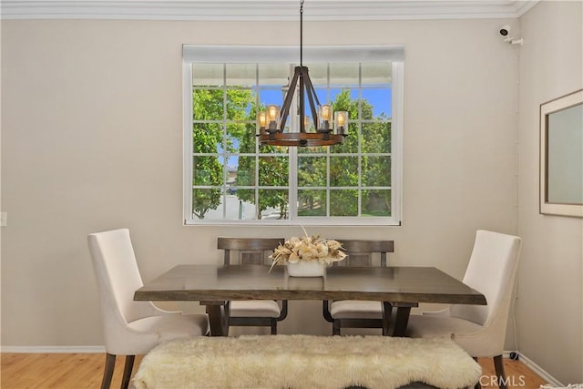 2548 S Young Ct, San Bernardino, CA 92408 - dining room featuring baseboards, plenty of natural light, wood finished floors, and a notable chandelier