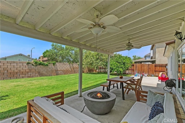 2548 S Young Ct, San Bernardino, CA 92408 - view of patio / terrace featuring a ceiling fan, a fenced backyard, and an outdoor living space with a fire pit