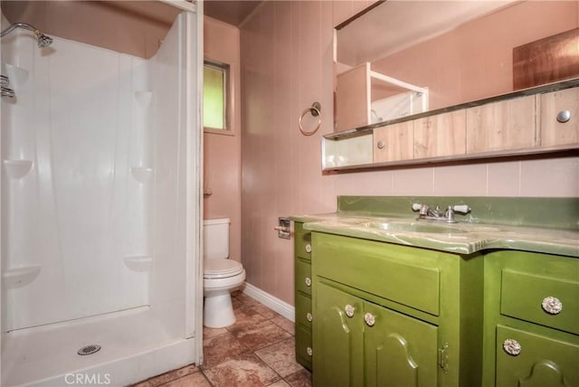 14109 Meadow Ln, Lytle Creek, CA 92358 - bathroom with baseboards, a shower stall, toilet, and vanity
