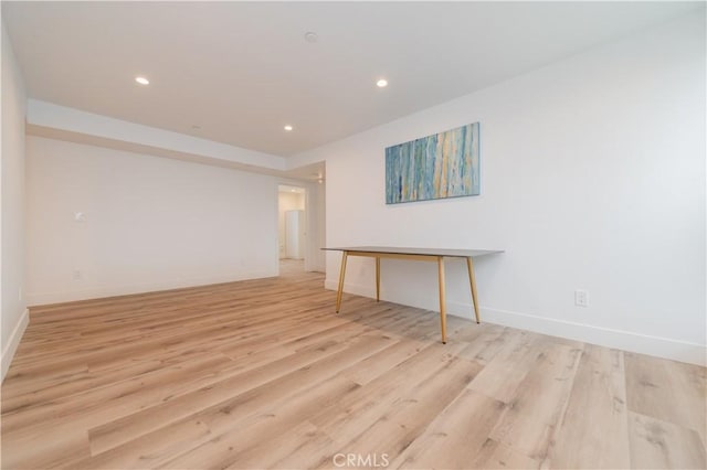 5652 La Mirada Ave, Los Angeles, CA 90038 - spare room with light wood-style floors, recessed lighting, and baseboards