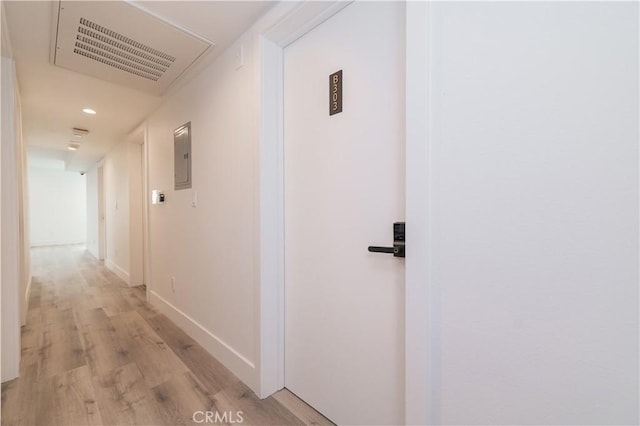 5652 La Mirada Ave, Los Angeles, CA 90038 - hall with light wood-style flooring, baseboards, and recessed lighting