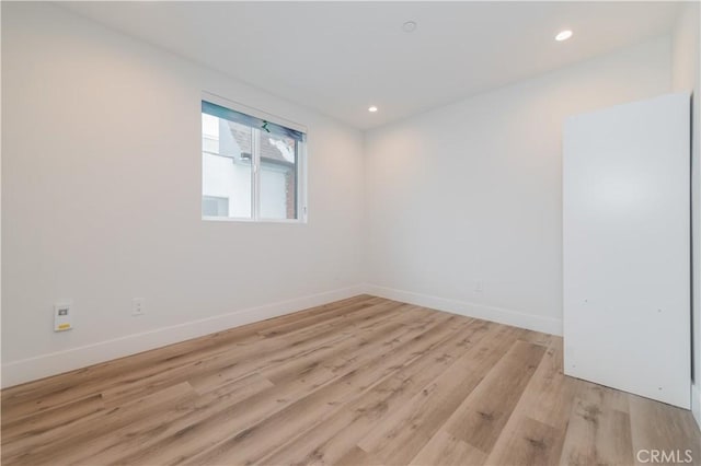 5652 La Mirada Ave, Los Angeles, CA 90038 - unfurnished room with light wood-style flooring, baseboards, and recessed lighting