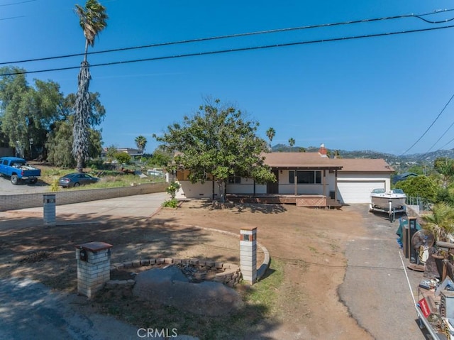 view of front facade featuring a garage and concrete driveway