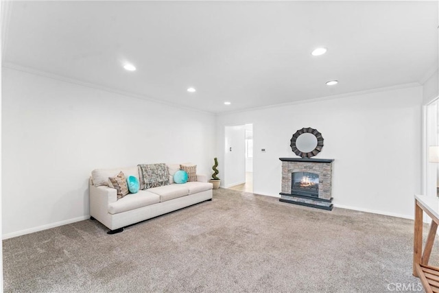 living room with recessed lighting, ornamental molding, a fireplace, and carpet flooring