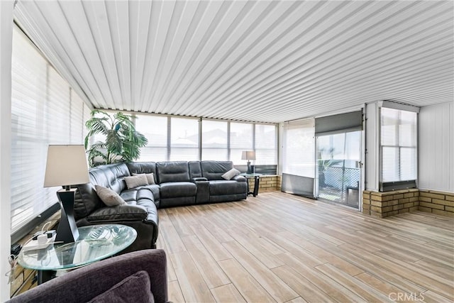 sunroom / solarium with wood finished floors