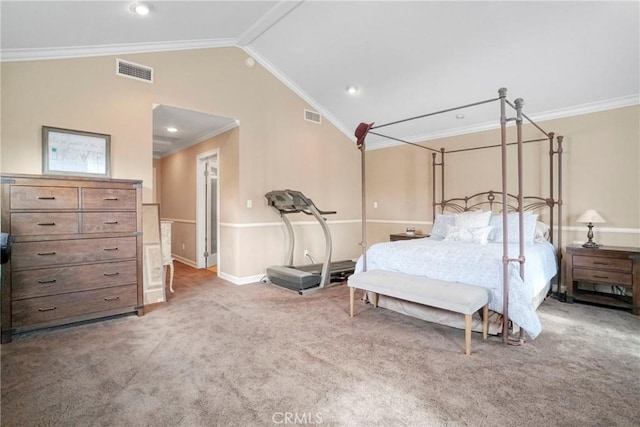 carpeted bedroom with visible vents, crown molding, vaulted ceiling, and baseboards
