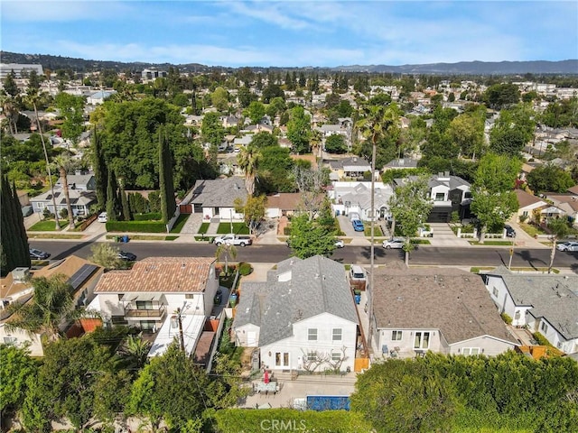 drone / aerial view with a mountain view and a residential view