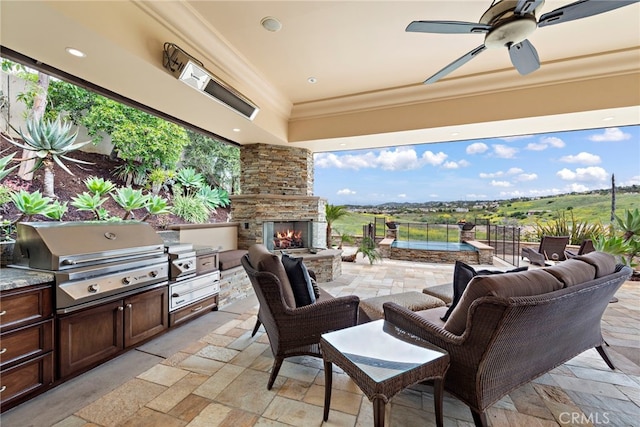 27561 Silver Creek Dr, San Juan Capistrano, CA 92675 - view of patio / terrace with an outdoor kitchen, fence, a grill, a ceiling fan, and an outdoor stone fireplace