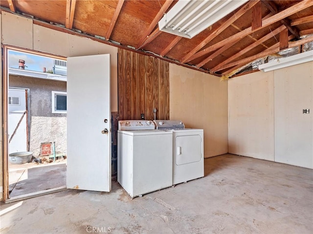 laundry area with separate washer and dryer and laundry area