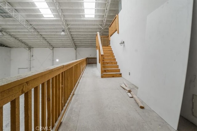 hallway featuring stairway