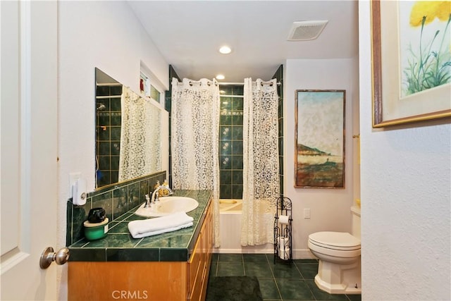 bathroom featuring recessed lighting, vanity, toilet, visible vents, and tile patterned flooring