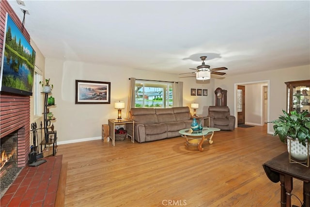 370 W 13th St, Upland, CA 91786 - living room with light wood-style floors, a brick fireplace, and ceiling fan