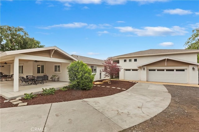 370 W 13th St, Upland, CA 91786 - view of front of property featuring a ceiling fan, driveway, and stucco siding
