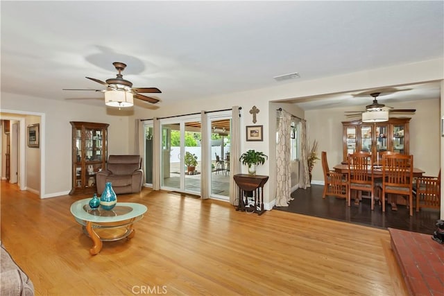 370 W 13th St, Upland, CA 91786 - living area with ceiling fan and wood finished floors