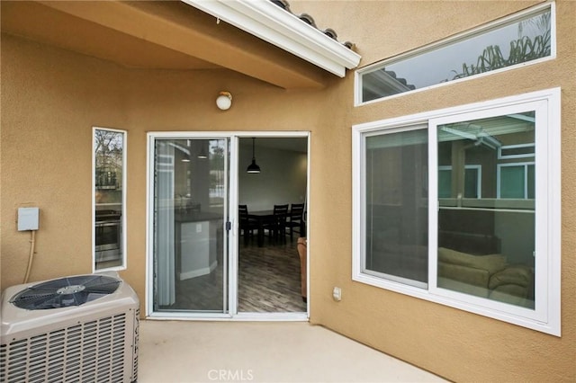 view of patio with central air condition unit